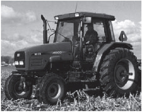 Figure 2. A ROPS with enclosed cab gives the operator the most protection from common hazards of tractor operation.