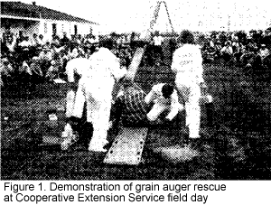 Figure 1 Demonstration of grain auger rescue at Cooperative Extension Service field day