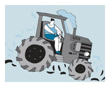 Person on tractor kicking up dirt