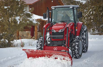 Photo of a tractor plowing snow
