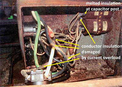 This is a picture of the melted insulation at capacitor post and other damage from the current overload