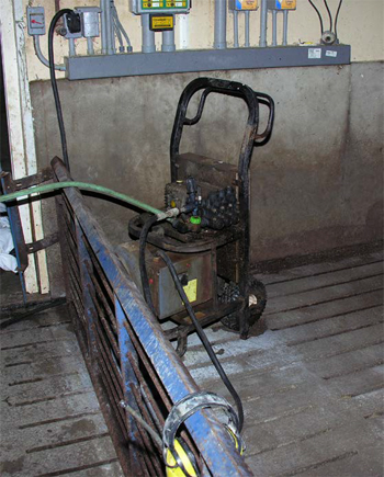 This is a picture of the pressure washer plugged into wall receptacle at the site.