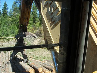 Photo 3 of the logs and loader