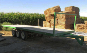 This is a photo of a flatbed trailer with hay bales