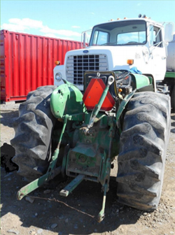 This is a photo of the incident scene showing the rear of the tractor the victim was operating