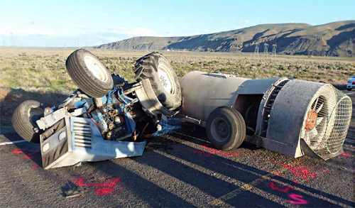 Photo of the scene of the incidnt where the tractor rolloed over on the road