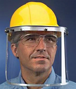 man wearing goggles and a face shield
