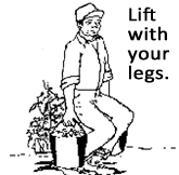 Worker using his legs to carry pots. Lift with your legs.